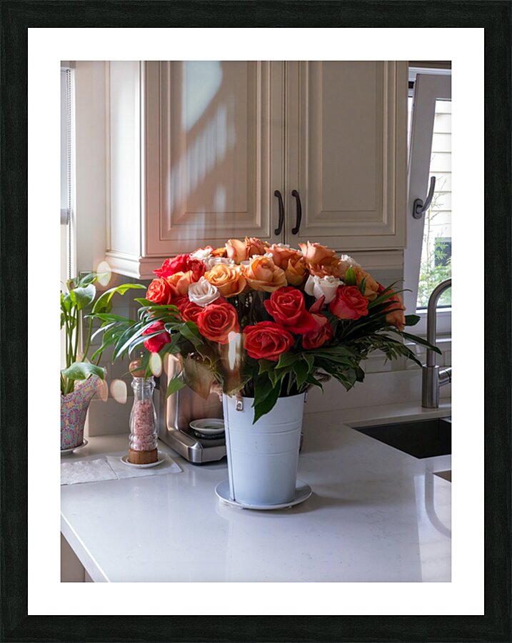 Bouquet of beautiful roses on the marble table in a kitchen Picture Frame print