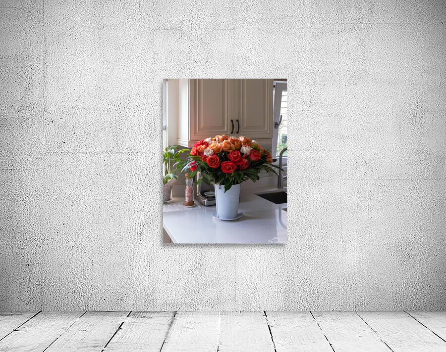 Bouquet of beautiful roses on the marble table in a kitchen Wall Preview