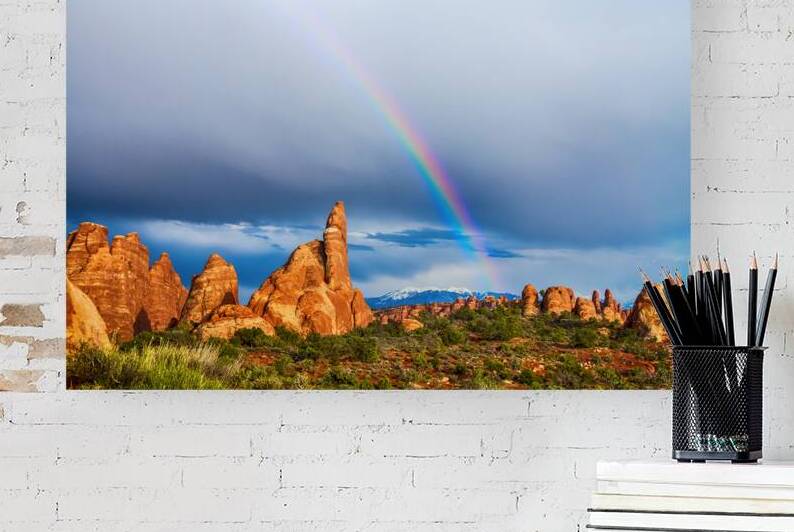 A Rainbows Light Over Utahs Desert Spires by Bo Insogna
