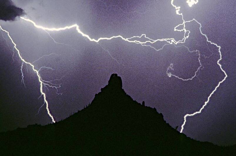 Pinnacle Peak Lightning Bolt Surrounded by Bo Insogna