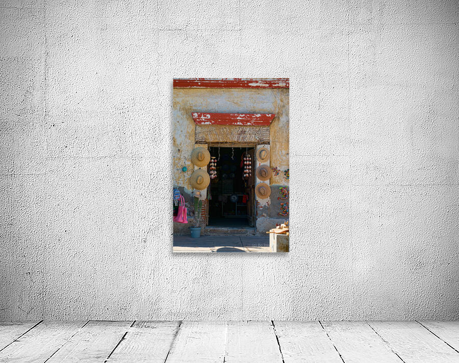 Rustic Mexican Shop Entrance With Traditional Hats Wall Preview