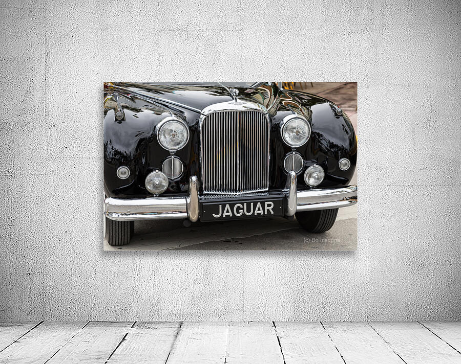 Front End of a Classic Old Black Jaguar Wall Preview