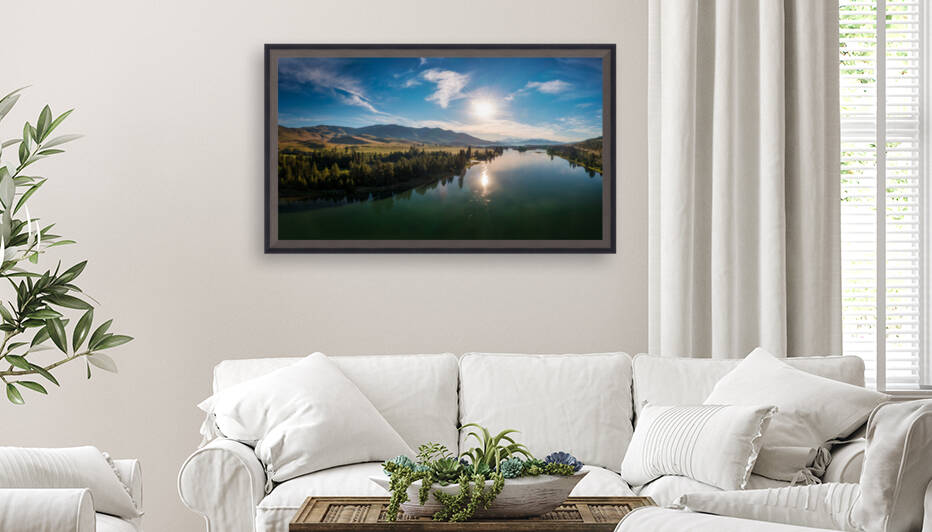 Sun rising over the Flathead River by Radd Icenoggle