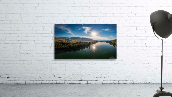 Sun rising over the Flathead River Wall Preview