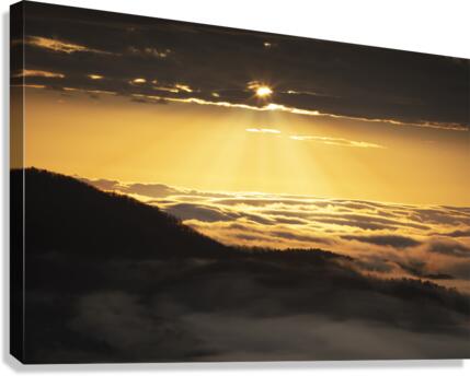 Sunrise Above The Clouds Canvas Print