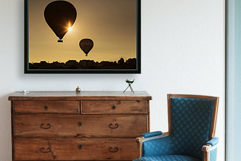 Hot air balloon flying over rock landscape at Cappadocia Turkey by MIRICA DAN-ALEXANDRU