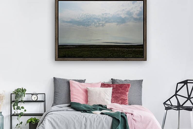 Bright sky in Tuktoyaktuk by Laurie Kindred