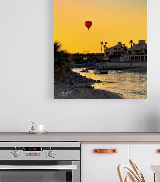 Red Balloon in the channel by Leslie Affeldt Photography