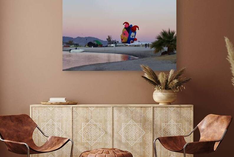 Balloons on the beach at sunrise by Leslie Affeldt Photography