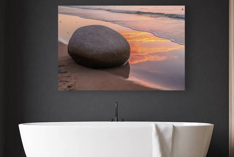 rock on the beach and reflection of sunset by Alin Cojocaru