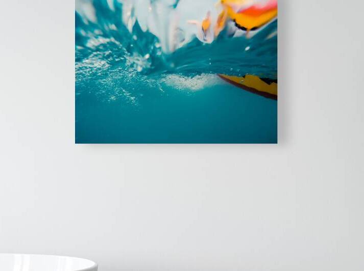 Underwater view of a moving inflatable ring that floating in the by Maor Winetrob