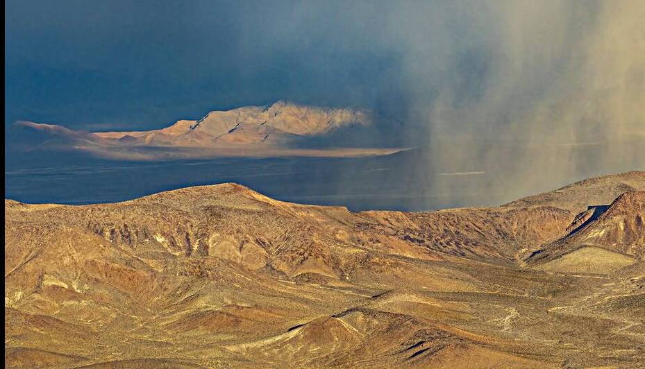 Death Valley Moods - Rain squalls light and shadows over Death Valley NP by Mike Lee