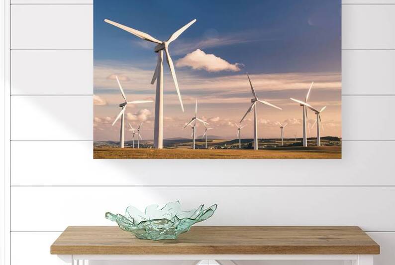 A vast open field with multiple wind turbines 4.j by Liviu Ghitun