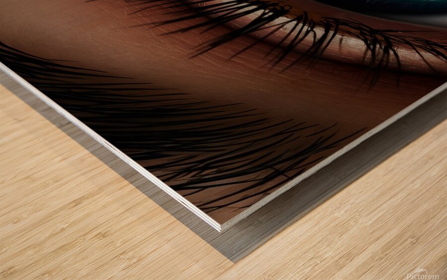a captivating close up of an eye with the pupil t Wood print