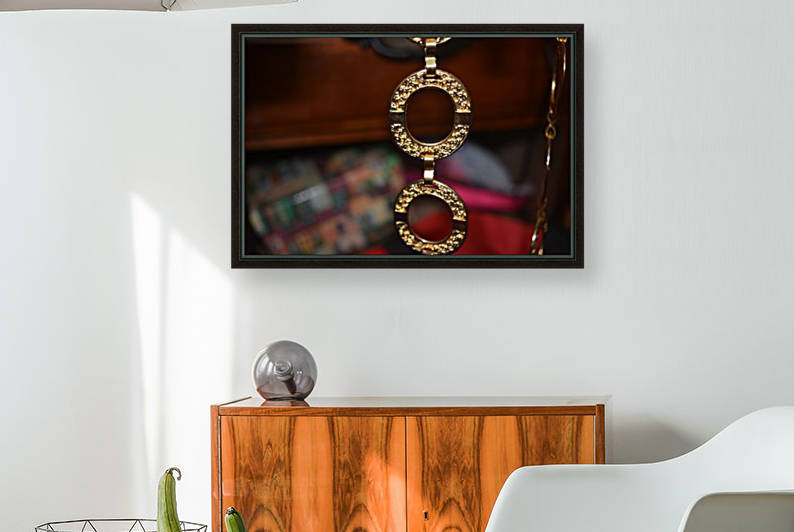 Golden necklace by Cassandra Lewis