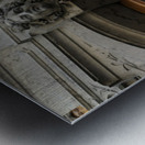 Wooden door with carved figurine in stone above it. France Metal print