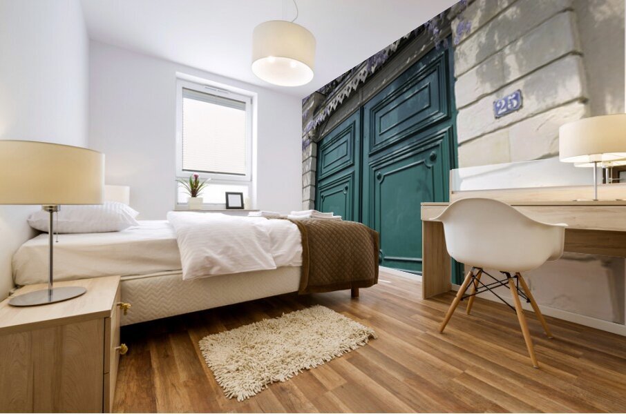 Green door with Wisteria plant in bloom. Nevers Nievre. France Mural print