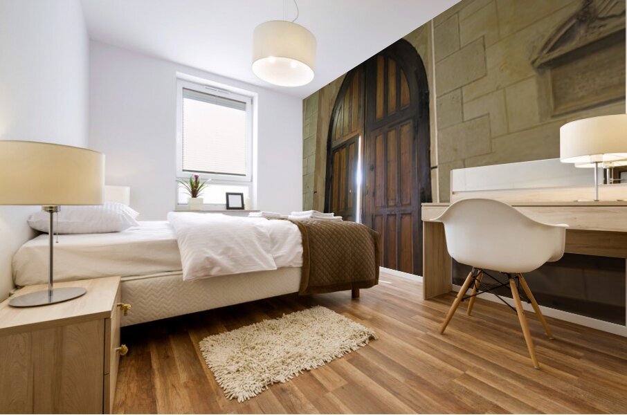 Shaft of light coming through the entrance door.  Eglise de Saint Maurice. Chatillon-sur-Loire Centre. France Mural print