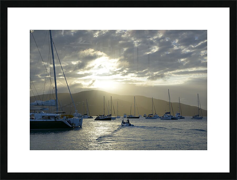 Dinghy heading out to the anchorage Picture Frame print
