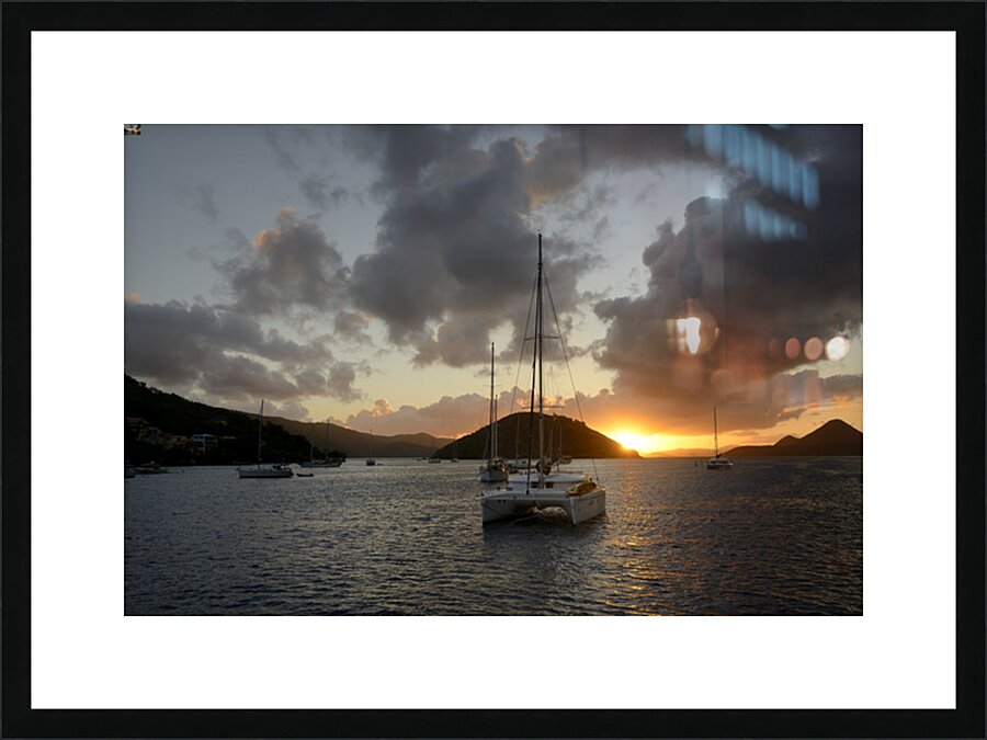 Caribbean sunset with catamarans and sailboats  Picture Frame print