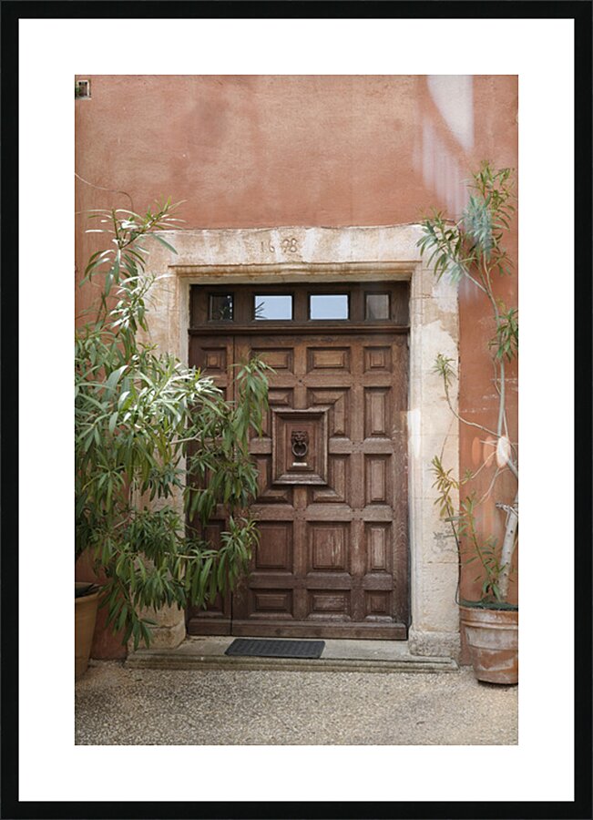 Wooden door with door knocker. Roussillon. France Picture Frame print