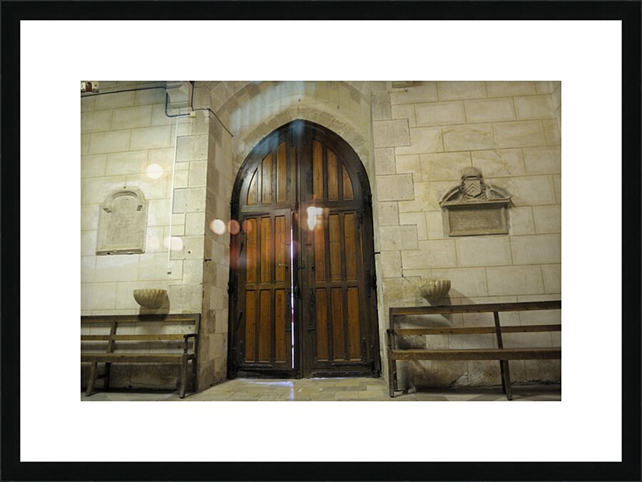 Shaft of light coming through the entrance door. Eglise de Saint Maurice. Chatillon-sur-Loire Centre. France Picture Frame print