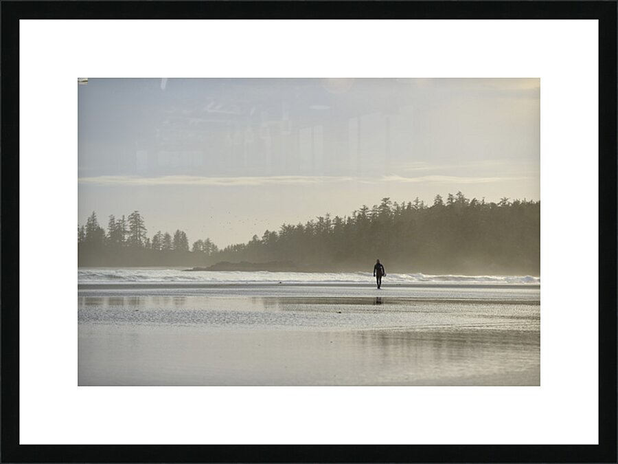 Man walking with surfboard through the mist Long Beach Pacific Rim National Park Picture Frame print