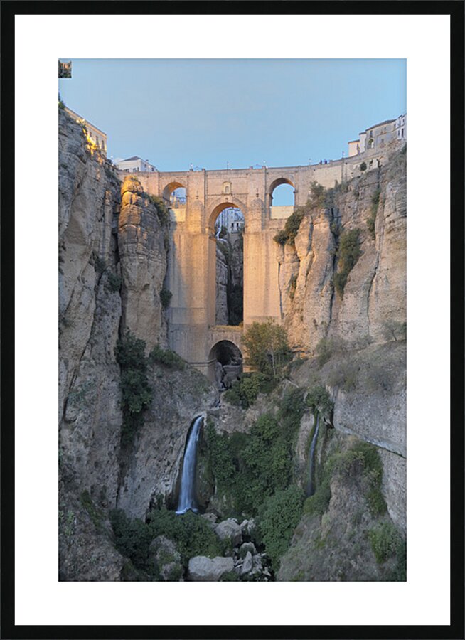 Guadalevín River and waterfall at dusk Puente Nuevo El Tajo Gorge Ronda Málaga Andalusia Spain Picture Frame print