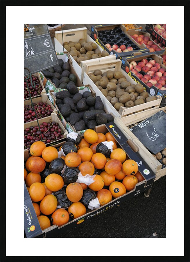 Oranges and avocados at a street market Châtillon sur Loire Centre France Picture Frame print