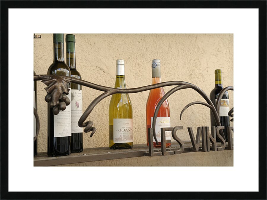 Les Vins Du Luberon store sign with bottled wine Lourmarin Vaucluse Provence Alpes Côte dAzur France Picture Frame print