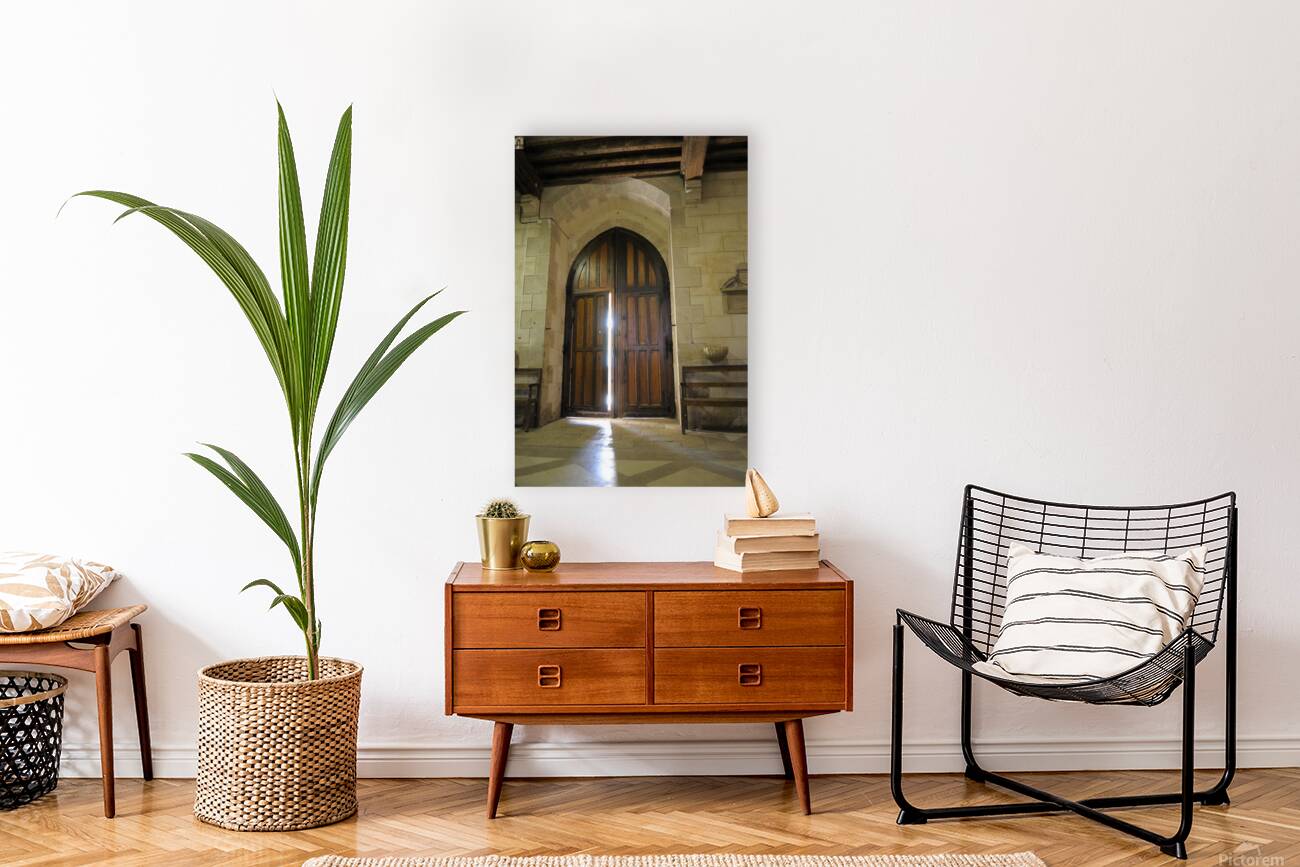 Shaft of light coming through the entrance door.  Eglise de Saint Maurice. Chatillon-sur-Loire Centre. France Reproduction