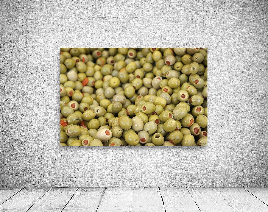 Green olives with pimentos been sold in bulk Lourmarin Wall Preview