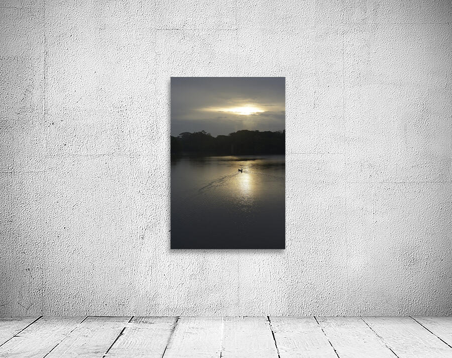 Canoeing on Lake Garzacocha at sunset La Selva Amazon Ecolodge Orellana Ecuador Wall Preview