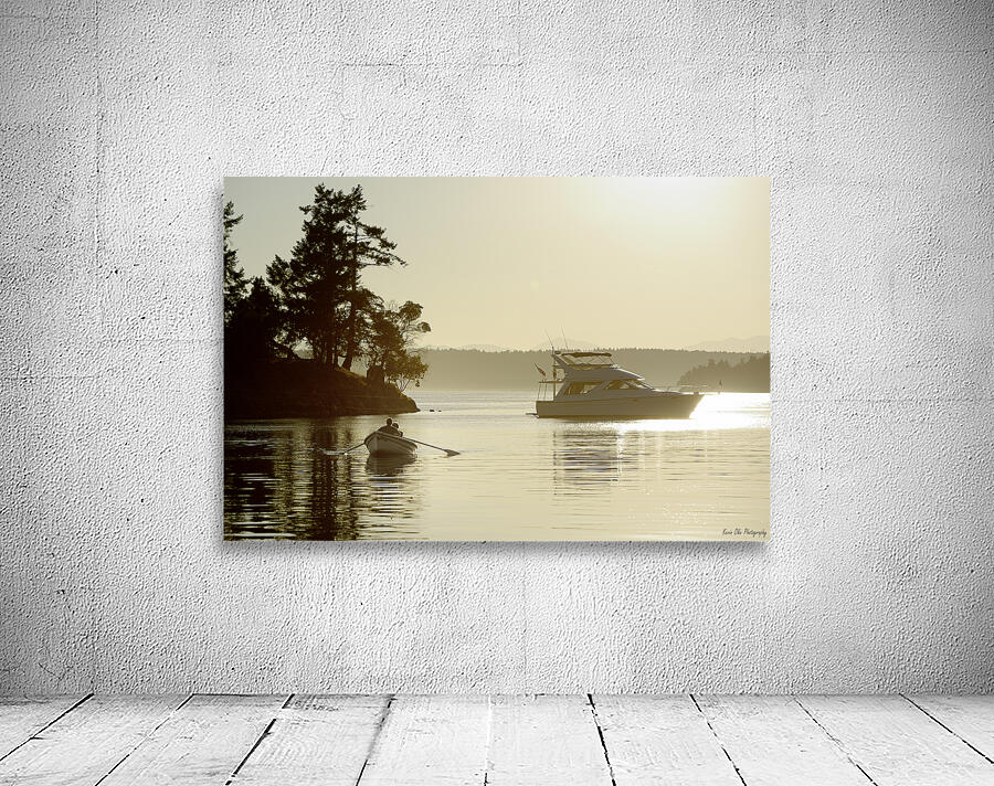 Couple in a dinghy rowing in front of a pleasure motorboat Wall Preview