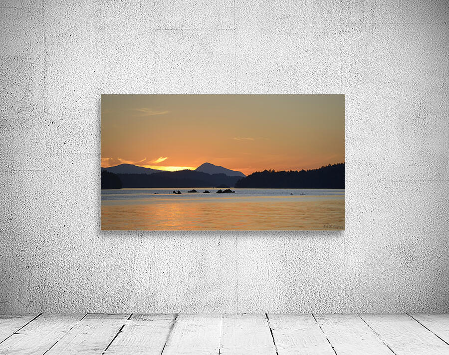 Kayakers near islets at the entrance to Princess Bay Wall Preview
