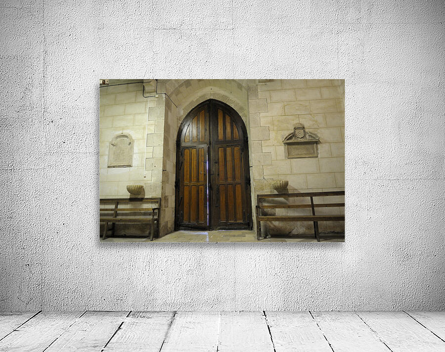Shaft of light coming through the entrance door. Eglise de Saint Maurice. Chatillon-sur-Loire Centre. France Wall Preview