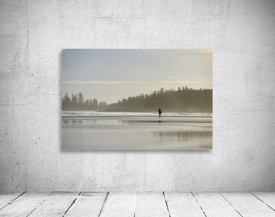 Man walking with surfboard through the mist Long Beach Pacific Rim National Park Wall Preview