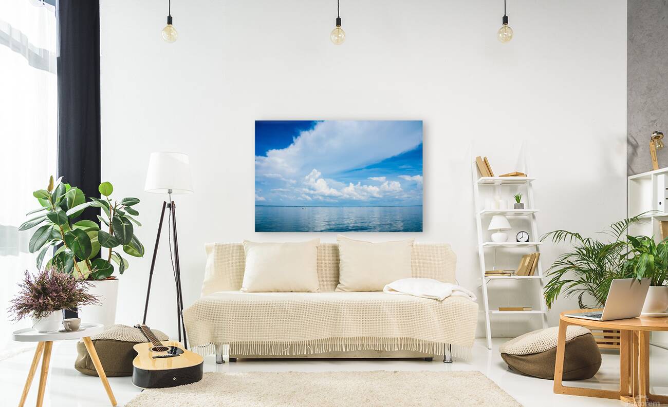 Seascape with bright blue cloudy sky. Reproduction