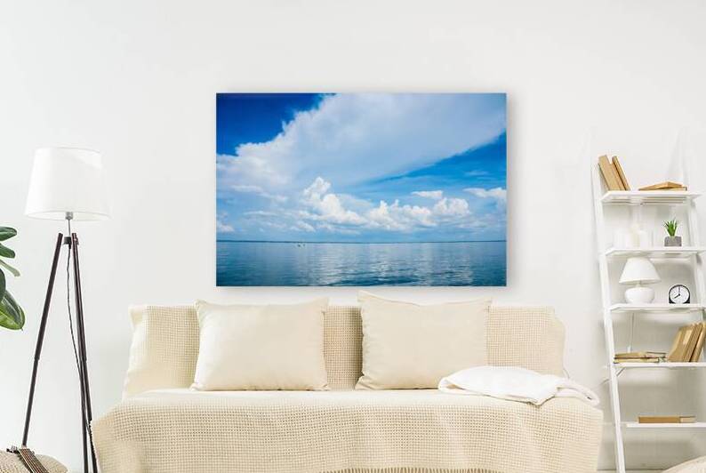 Seascape with bright blue cloudy sky. by CameraOldStyle