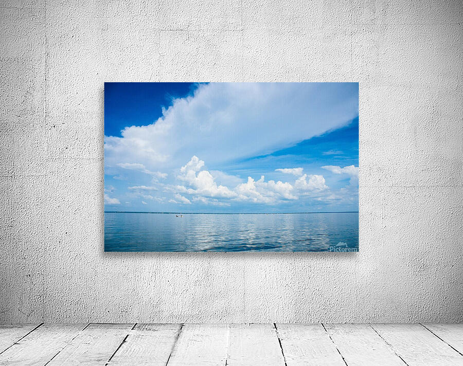 Seascape with bright blue cloudy sky. Wall Preview
