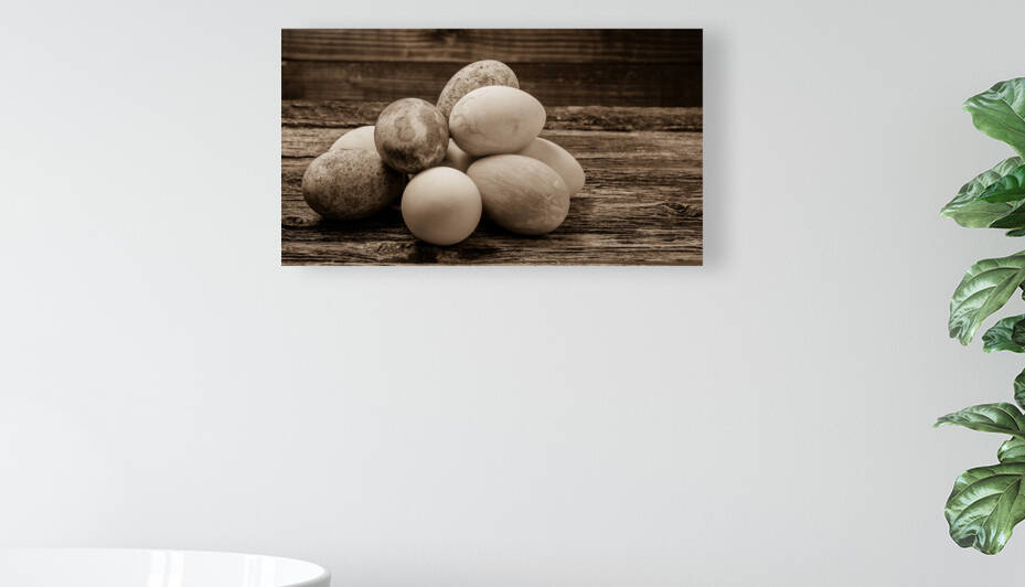 Easter eggs on rustic wood in sepia tone by MVP
