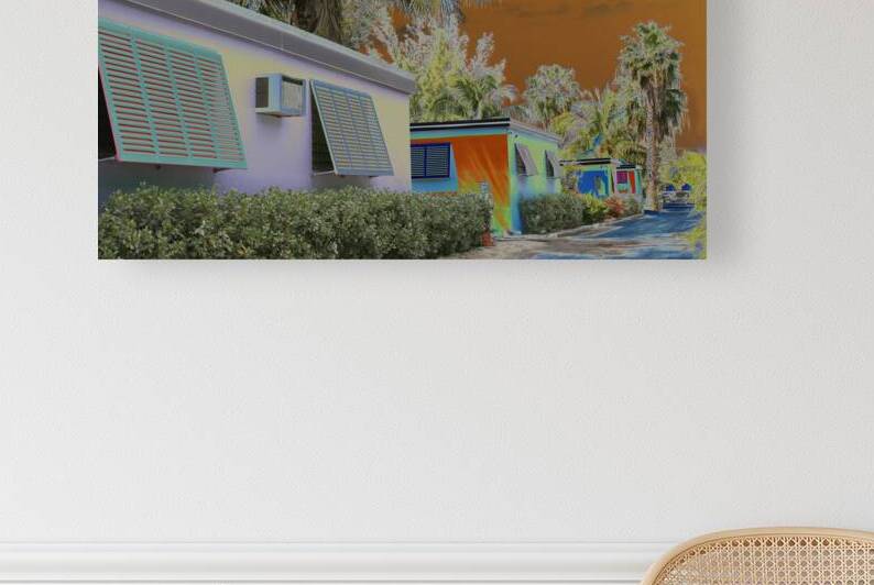 Orange Sky Cottages by Rene Griffith