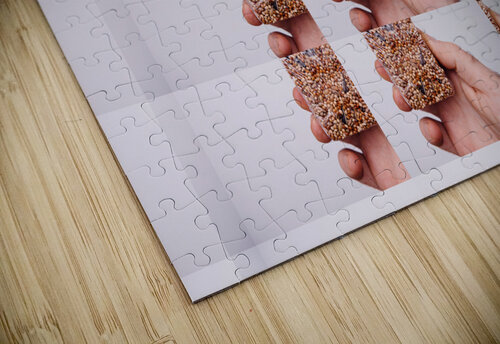 Hand Holding Seed Snack with Repetitive Pattern Adrian H  puzzle