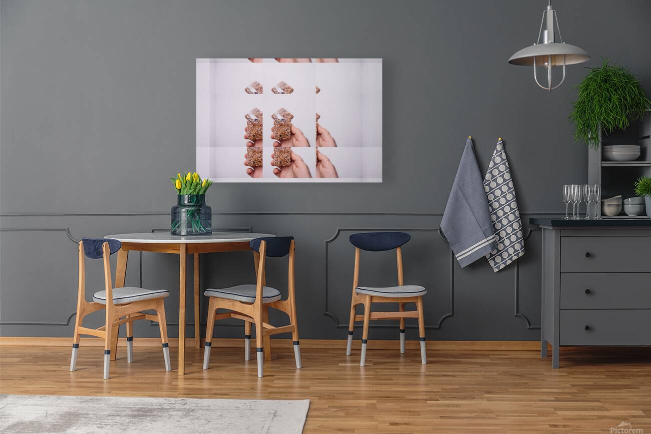 Hand Holding Seed Snack with Repetitive Pattern Reproduction