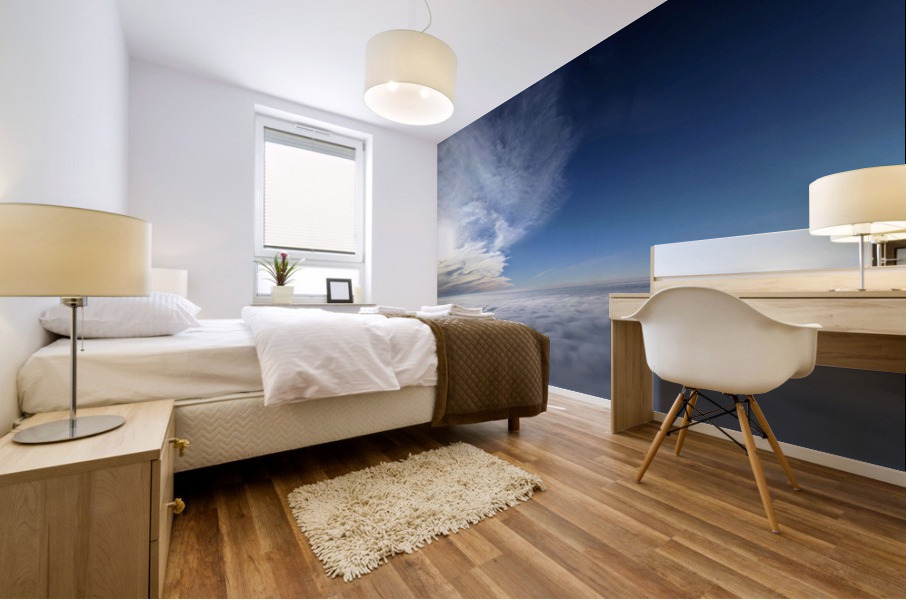 Above the clouds with sun behind cloudscape beyond Mural print