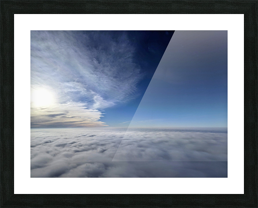 Above the clouds with sun behind cloudscape beyond Picture Frame print
