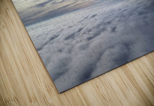 Above the clouds with sun behind cloudscape beyond Michael Geyer puzzle