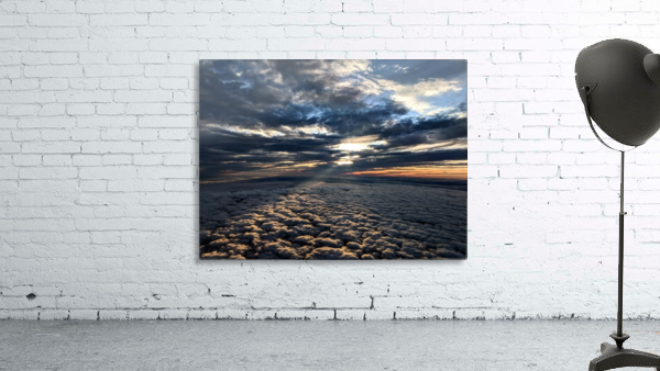 Light peering down upon the clouds Wall Preview