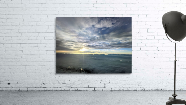 Sunset behind clouds Wall Preview