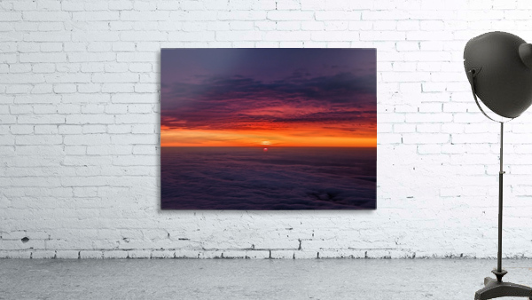 Vibrant sunset among cloud cover Wall Preview